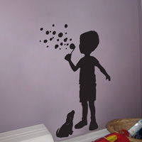 Little Boy blowing Bubbles with his puppy - Wall Decals